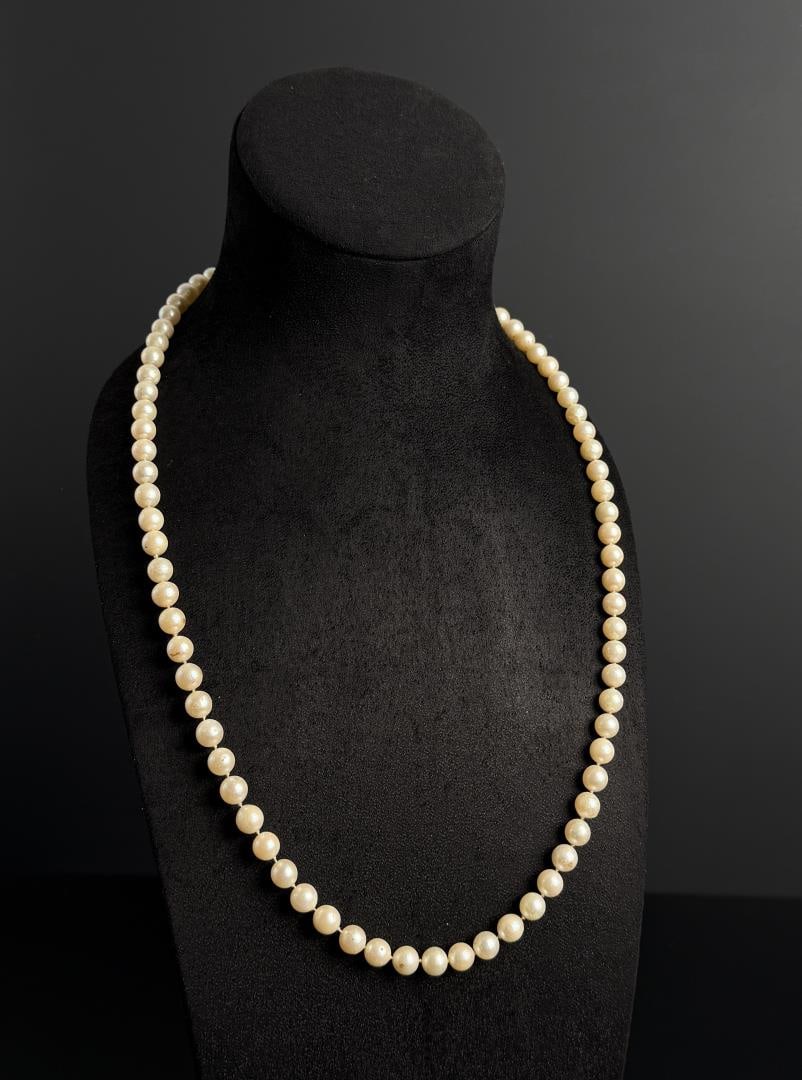 Cultured Pearl Necklace: 13 1/2" long as displayed.