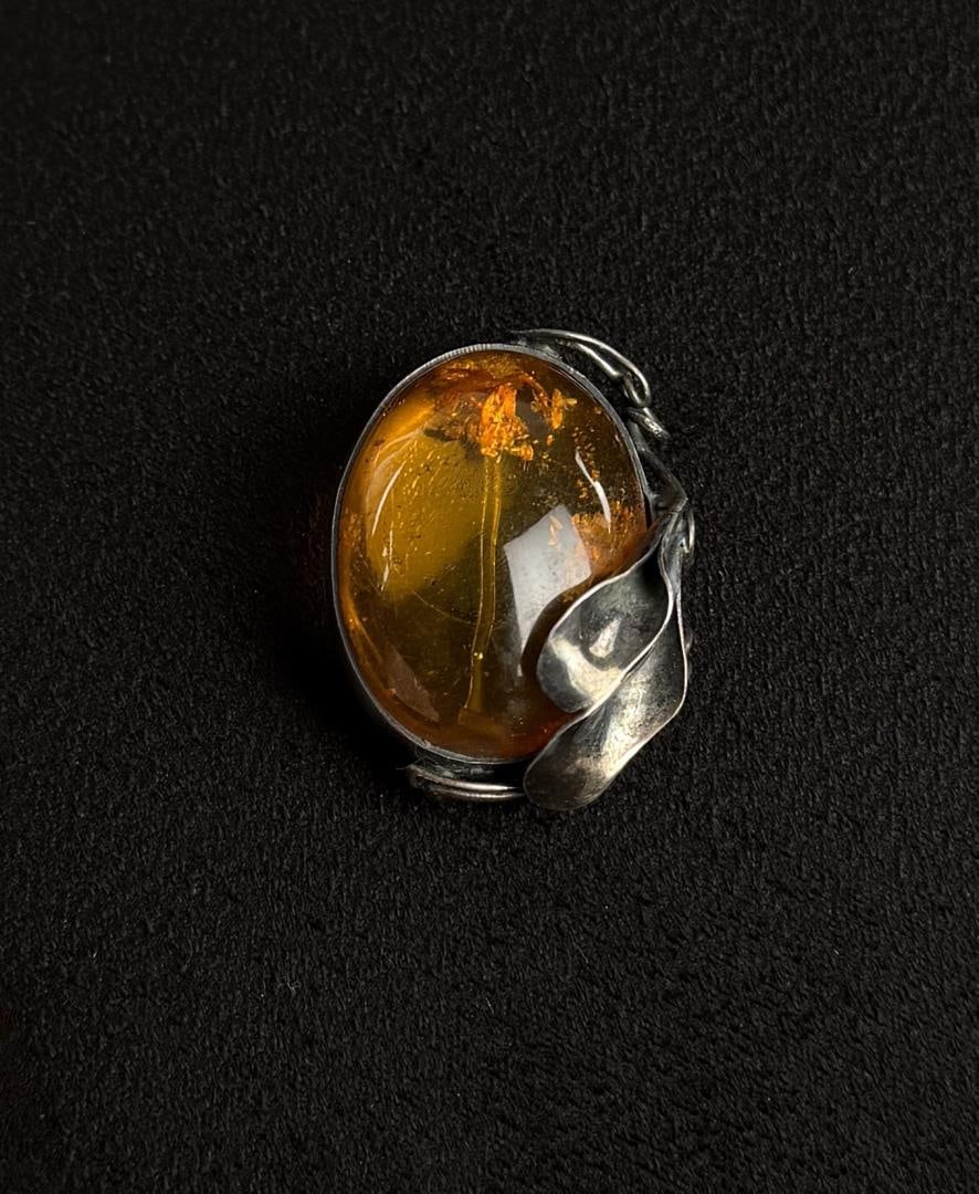 Sterling Silver Baltic Amber Brooch: 11.7 grams. 1 1/2" long.