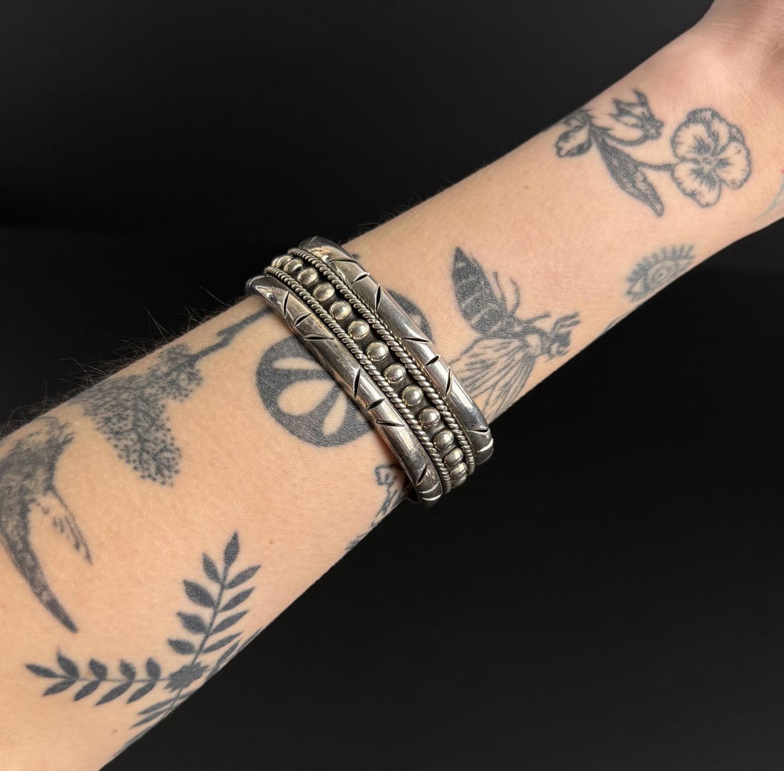 Taxco Mexico Sterling Silver Bracelet: 44.5 grams. 5 3/4" interior circumference.