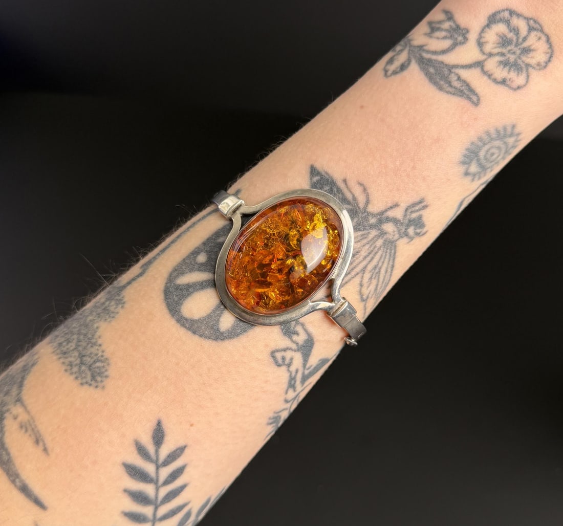 Sterling Silver Baltic Amber Bracelet: 6" inner circumference. 32.27 grams.