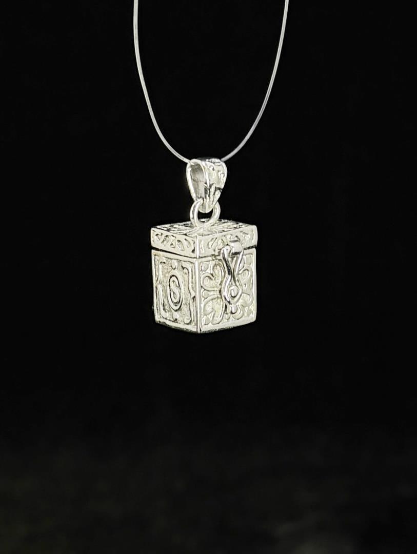 Sterling Silver Prayer Box Pendant: 4.6 grams. 1/2" long.