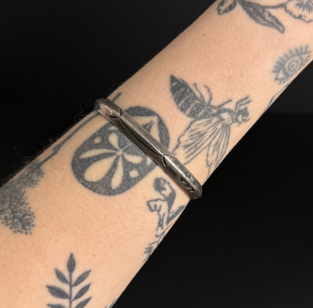 Navajo Sterling Silver Ingot Bangle Bracelet: 6 1/4" inner circumference. 22.03 grams.