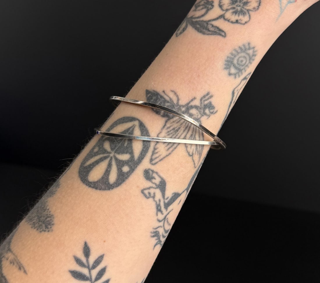 .835 Mid Century Stacked Silver Bangle Bracelets: 15.7 grams. 6 1/4" inner circumference.