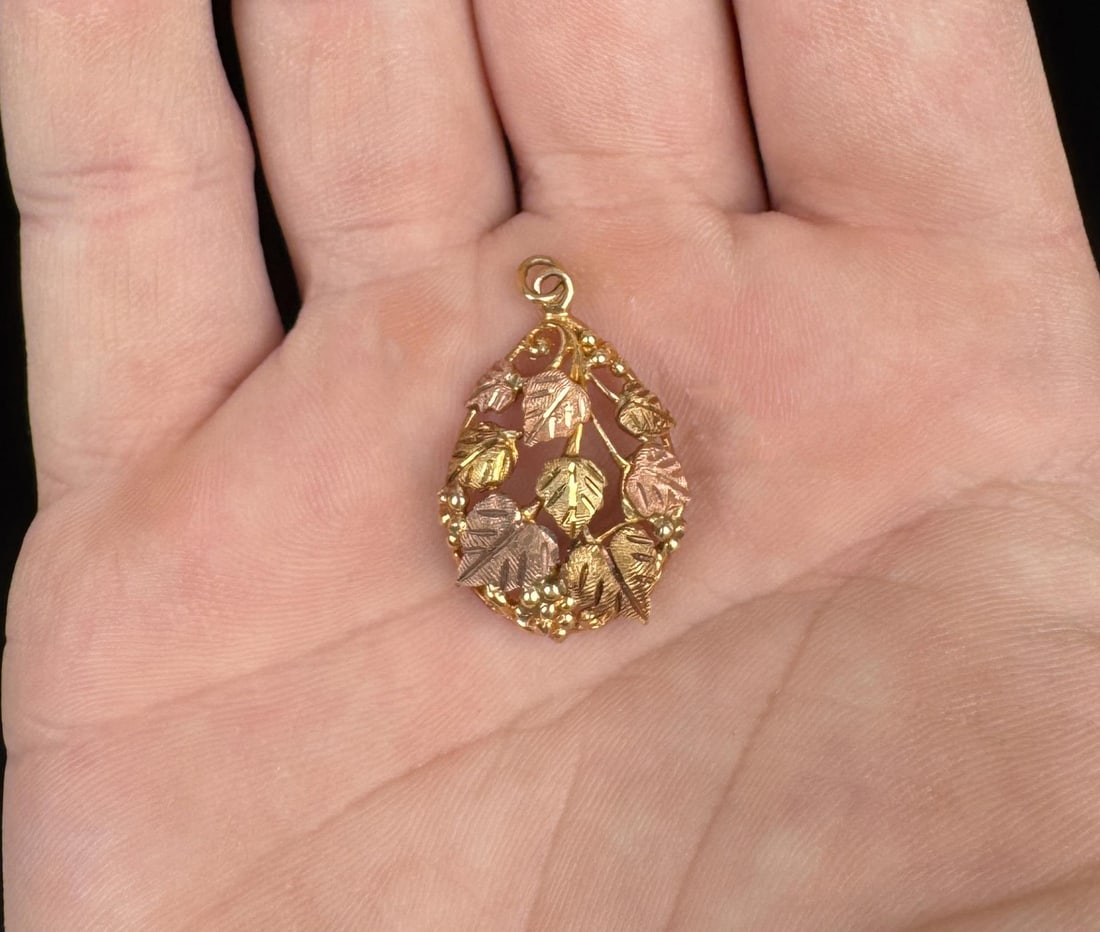 10K Black Hills Gold Pendant: 5/8" by 7/8". 2.84 grams