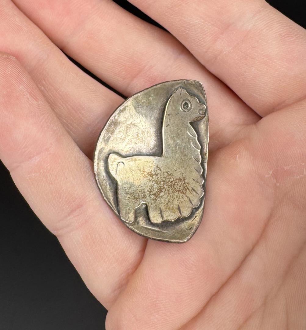 Hammered Sterling Silver Llama Brooch: 1" by 1 3/8". 10.21 grams