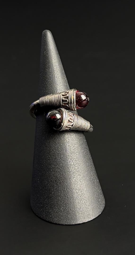 Sterling Silver Garnet Norse Ring: 7.7 grams. Size 6