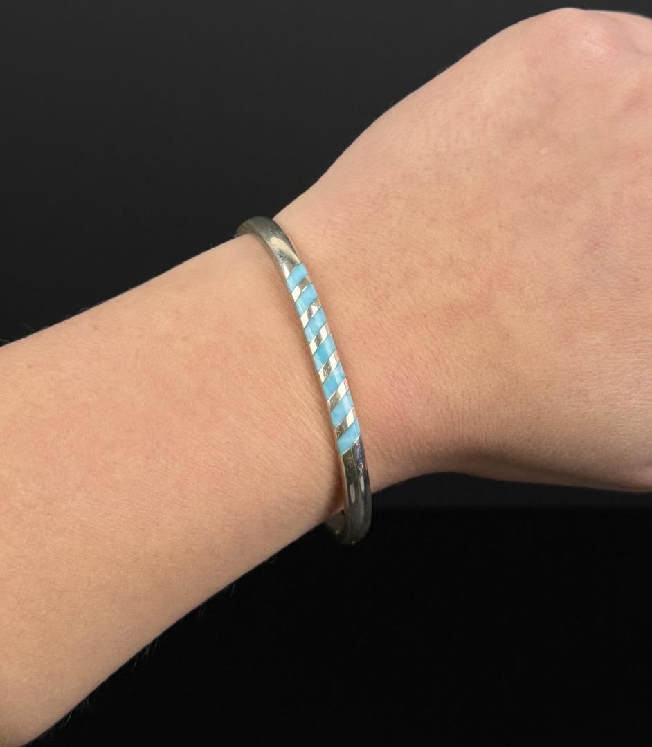 Sterling Silver Turquoise Inlaid Bracelet: 19 grams. 6 1/2" inner circumference.