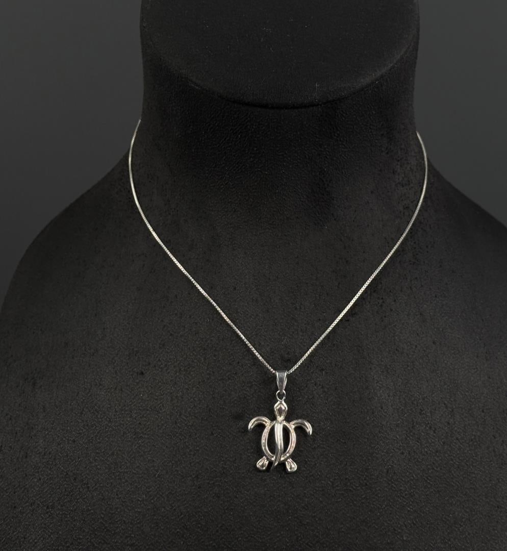 Sterling Silver Turtle Necklace: 4 grams. 9 1/2" long as displayed.