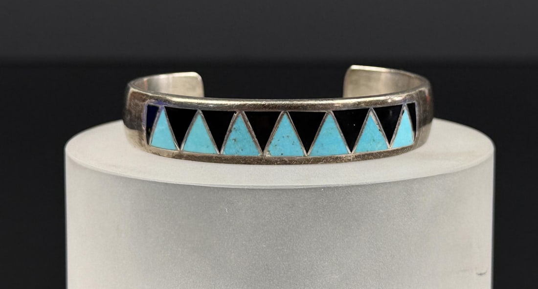 Leonard Paquin Zuni Sterling Silver Bracelet: 40 grams. 6" interior circumference.