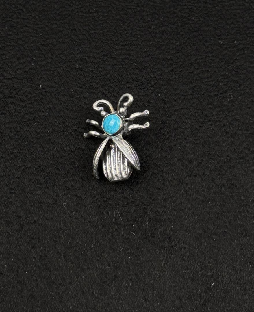 Navajo Sterling Silver Bug Turquoise Brooch: 1" long. 3.89 grams.