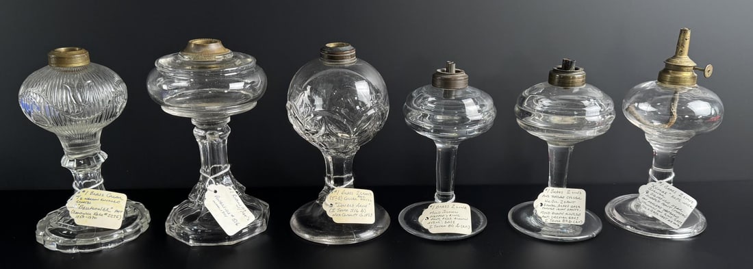 Collection of 19th Century Whale Oil Lamps: Nice grouping. Largest is 8" tall. One shows a bellflower pattern. One has a komax rope wick.