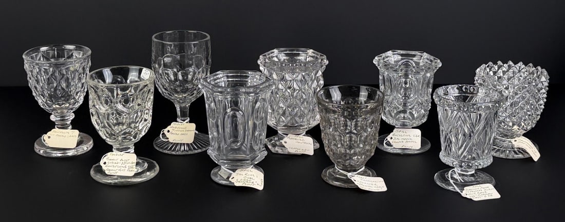 Collection of Flint Glass Spill Spooners: Flint and pressed glass. Largest 3 1/4" by 5 7/8". Group of 9.