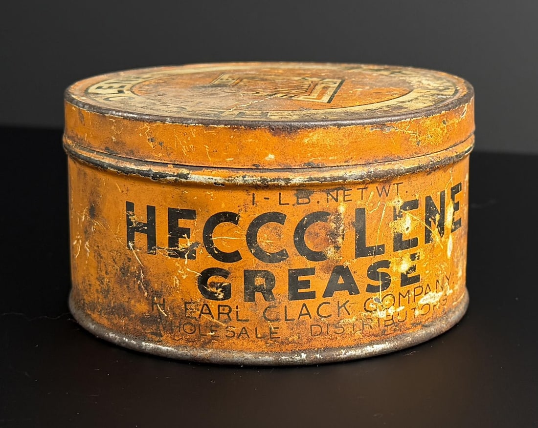 H. Earl Clack Montana Heccolene Oil Grease Can: 4 1/4" diameter, 2 1/4" tall.