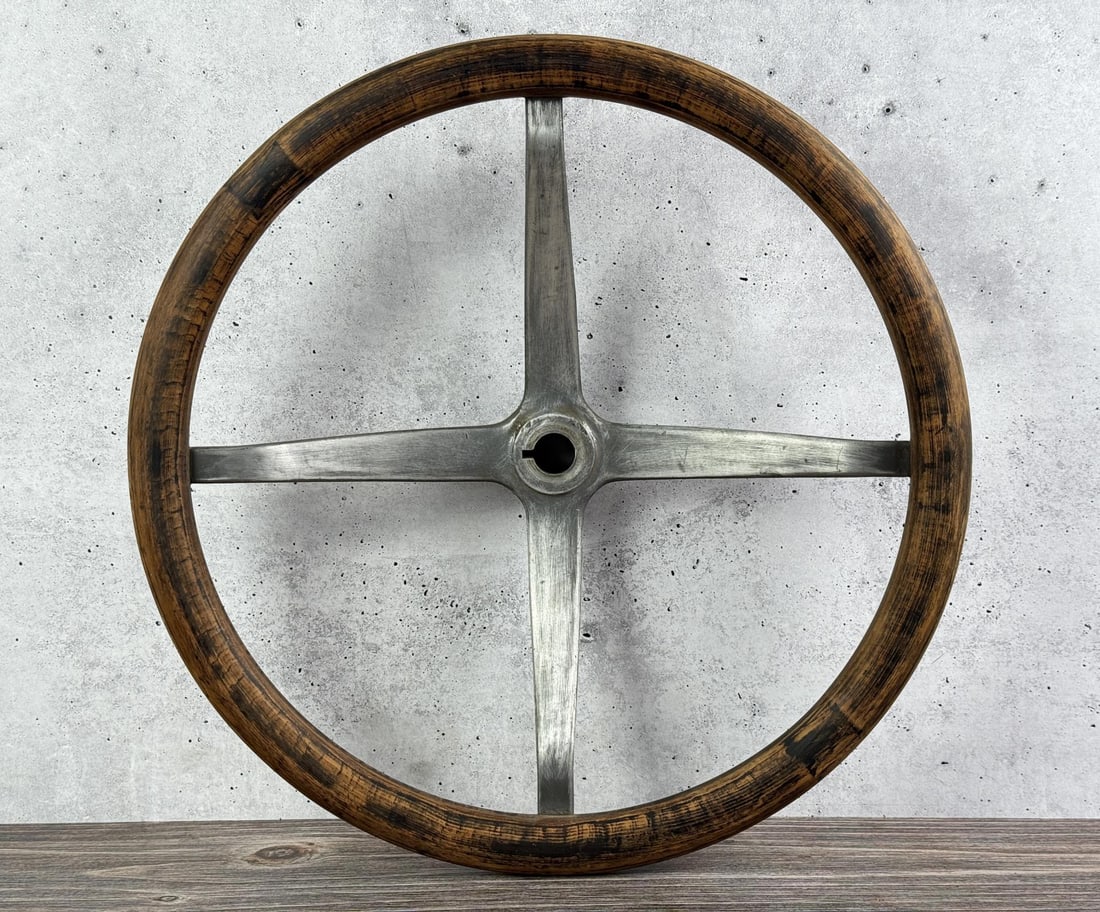 Dodge 1920s Steering Wheel: 16 7/8" by 16 7/8" by 3 7/8". It has a cast iron or aluminum four-spoke "spider" or hub assembly.