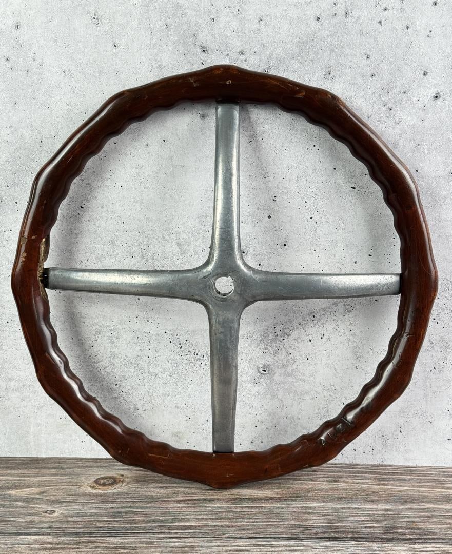 Ford Model T Steering Wheel: 16 7/8" by 16 7/8" by 2". This features four spokes in a spider configuration.
