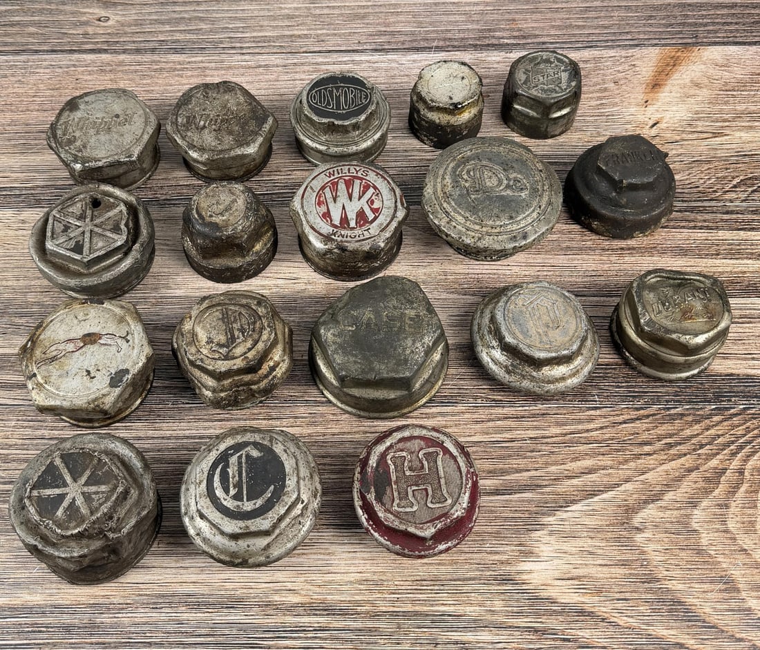 Collection of Early Car Grease Cap Hubcaps: Including Durant, Willys, Franklin, Star, Oldsmobile, Hupmobile.