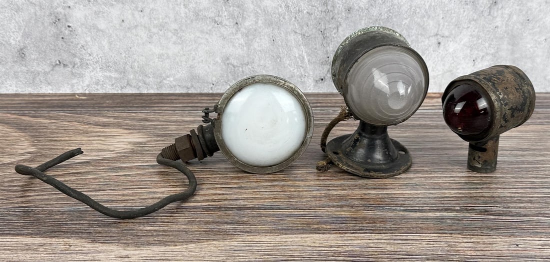 Ford Model T Fender Indicator Running Lights: Group of 3. Largest is 2 1/2" by 4 1/4".