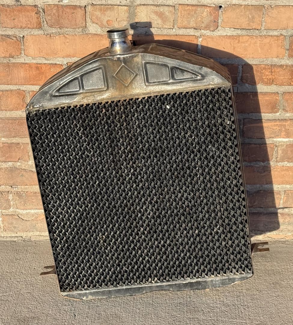 Ford Model T Radiator: 22 1/4" wide. 27 1/4" tall to spout neck.