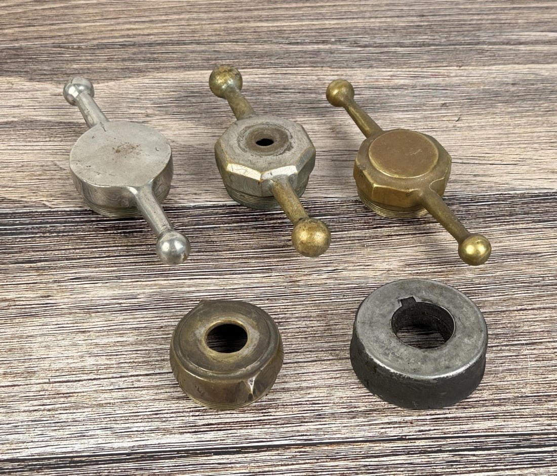 Dog Bone Radiator Caps for Early Cars: Group of 3 with two neck caps. One Greenland cap.