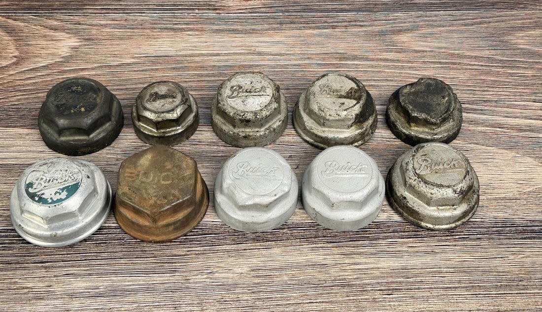 Group of Buick Grease Cap Hubcaps: 10 total, all hex design.