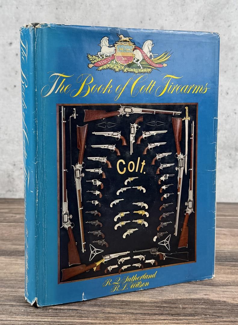 The Book of Colt Firearms: R.Q Sutherland and Larry Wilson, 1971. Signed by Larry Wilson and dedicated to David Cooley. First edition.