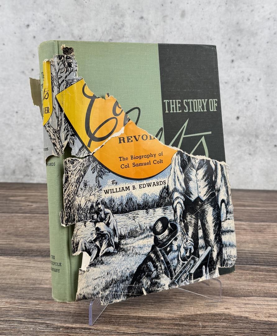The Story of Colts Revolver: William B. Edwards, 1953. Signed by the previous owner, David Cooley. Dust cover is torn.
