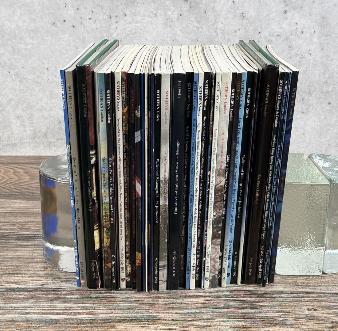 Sothebys and Other Auction Catalogs: Consists of antique, modern, and vintage sporting gun auction catalogs featuring rare rifles, shotguns, and pistols. 38 total.