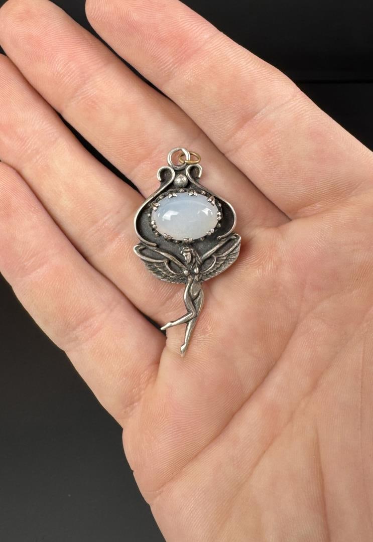 Sterling Silver Moonstone Fairy Pendant: 1 1/2" by 3/4". 6.36 grams.