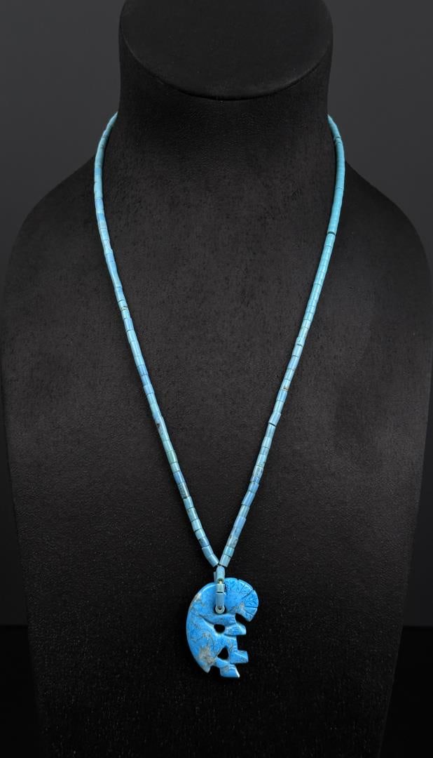Navajo Carved Rolled Turquoise Kokopelli Necklace: 14 1/2" long as displayed.