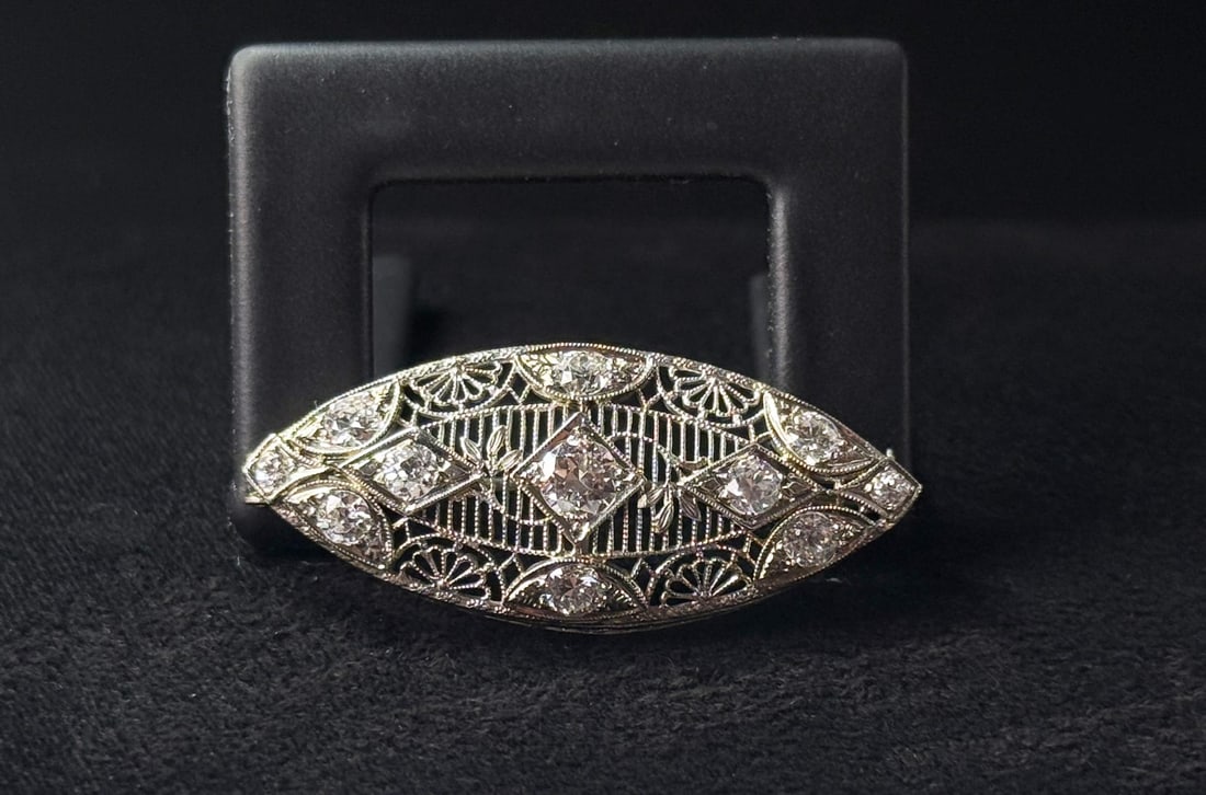 Outstanding 14k White Gold Art Deco Diamond Brooch: 1 1/2" by 5/8". 5.64 grams. Lot requires payment via non credit card only.