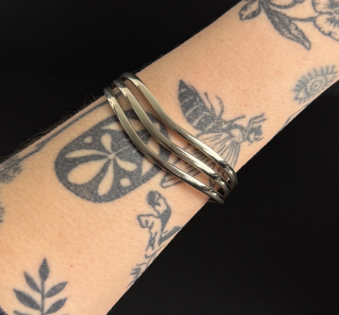 Sergio Lub Stainless Steel Bracelet: 5 1/2" inner circumference.