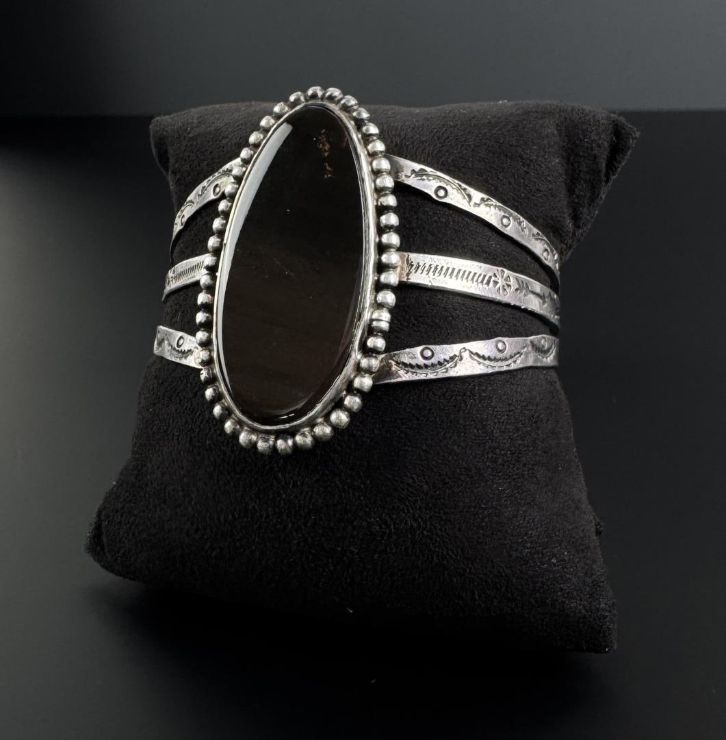 Old Pawn Navajo Sterling Silver Onyx Bracelet: 5 3/4" inner circumference. 38 grams.