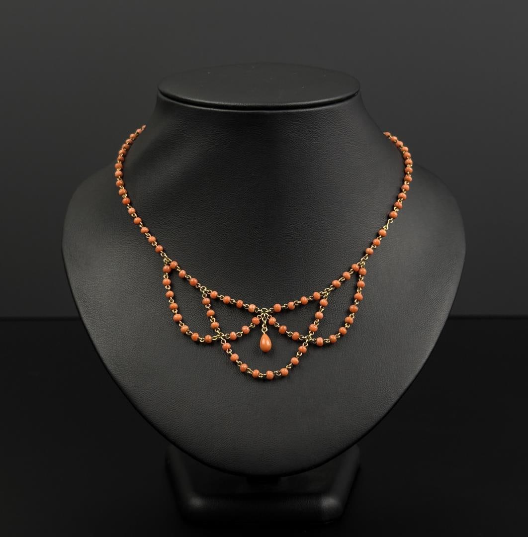 14k Gold Angelskin Coral Festoon Necklace: Very nice old piece of Edwardian jewelry. 8 1/4" long as displayed. 6.69 grams.