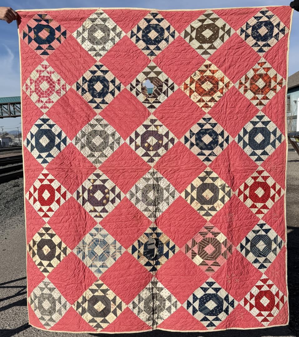 1860s Pennsylvania Shoofly Quilt: Two holes as shown. 63 1/2" by 76 1/2". Initialed as shown.