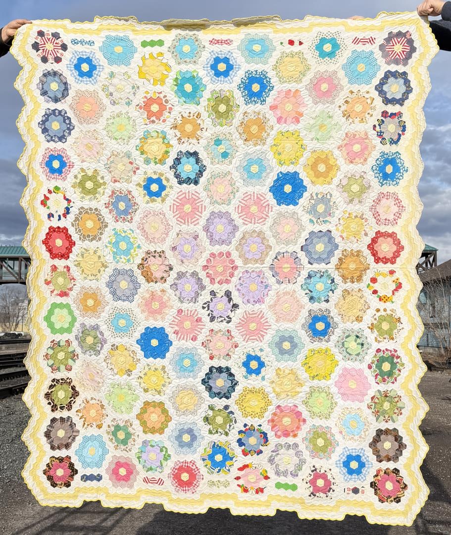 1930s Grandmothers Flower Garden Quilt: 68 1/2" by 84 1/2". Signed by maker.