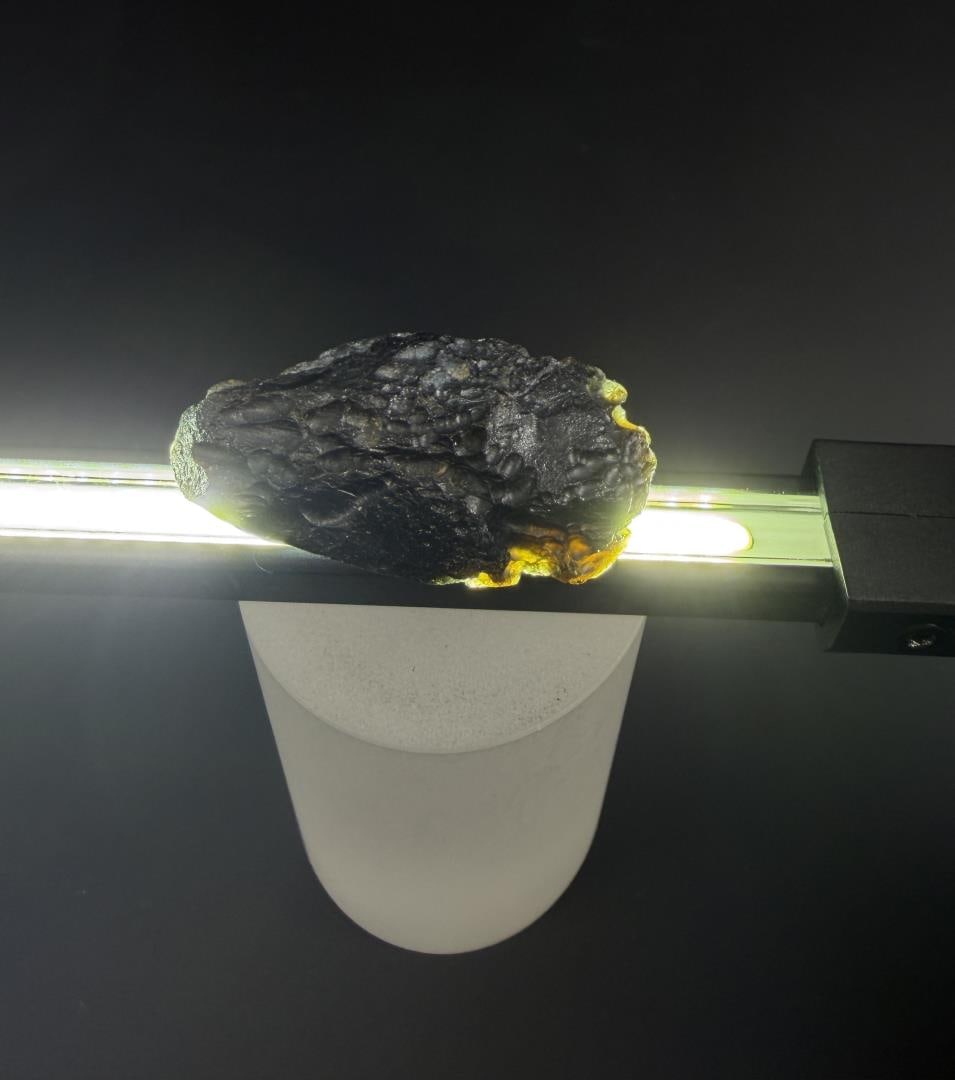 Rare Asteroid Crash Green Moldavite: 17 grams. 1 1/2" by 3/4" by 5/8".