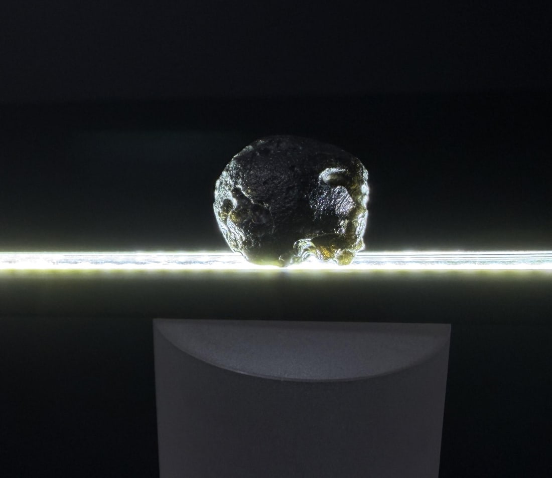 Rare Asteroid Crash Green Moldavite: 8.43 grams. 3/4" by 3/4" by 1/2".