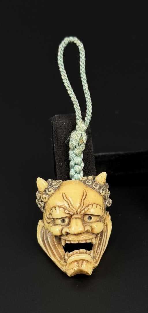 Japanese Celluloid Noh Mask Netsuke: 3 1/8" long with cord.