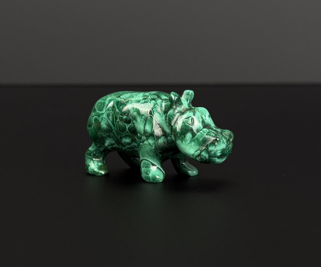 African Malachite Hippo Carving: 2 1/4" by 1 1/4" by 1". 87 grams.