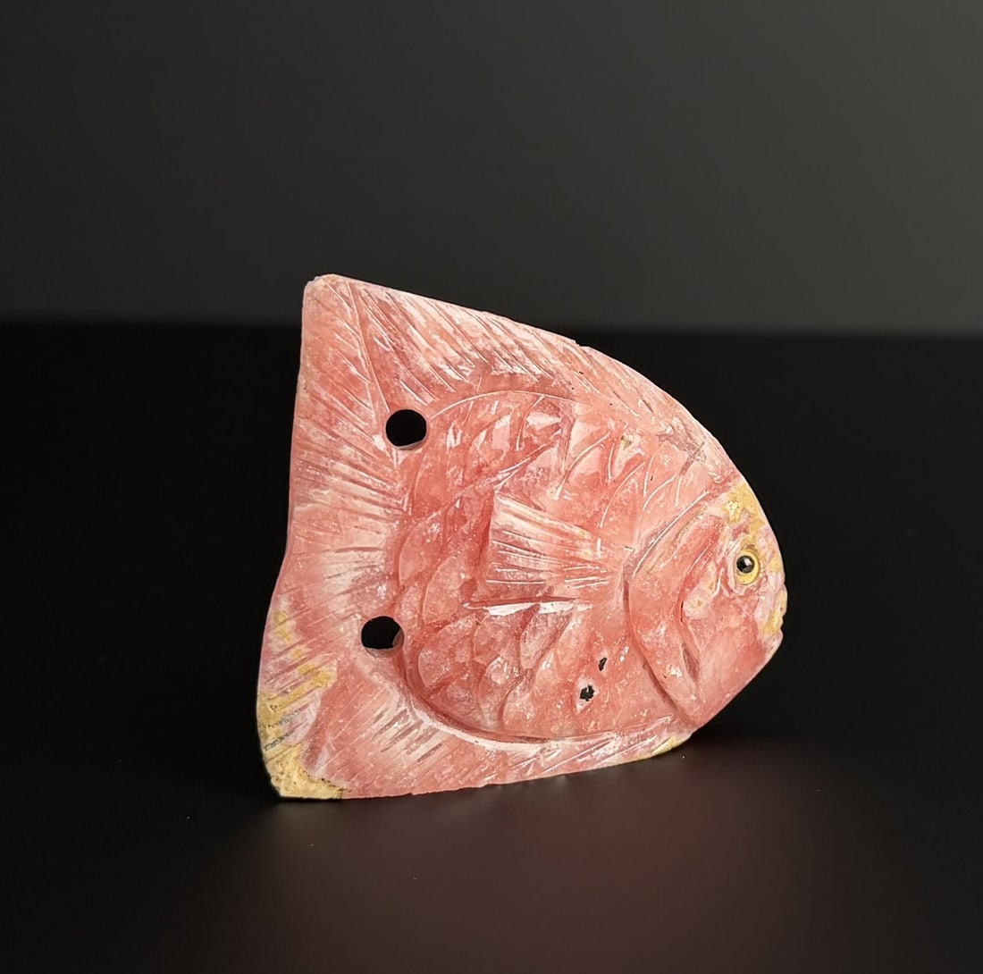 Rhodochrosite Fish Carving: 2" by 1 3/4" by 1/4". 38.19 grams.