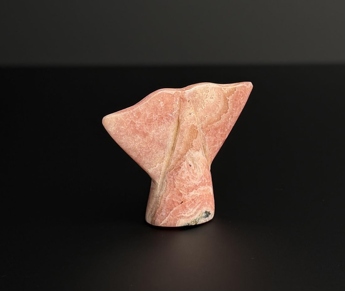 Rhodochrosite Whale Tail Carving: 1 3/4" by 1 1/2" by 5/8". 18.62 grams.