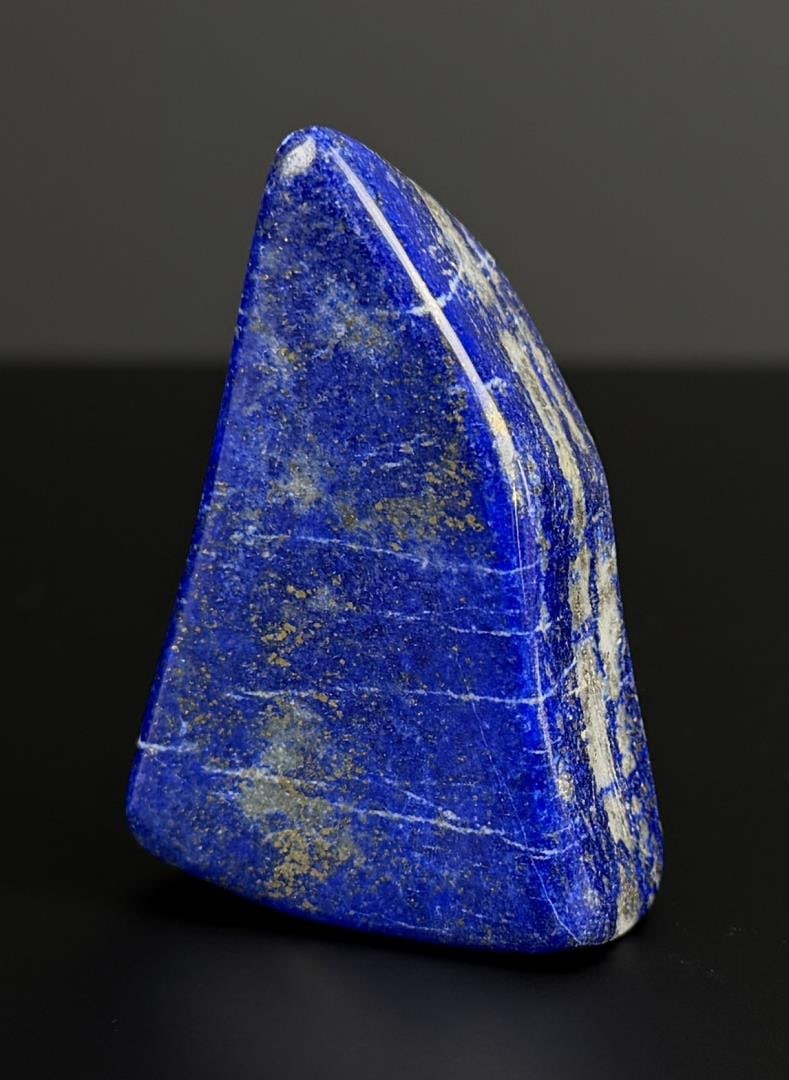 298ct Lapis Lazuli Stone Carving Media: 59.6 grams. 2 1/8" by 1 1/2" by 5/8".