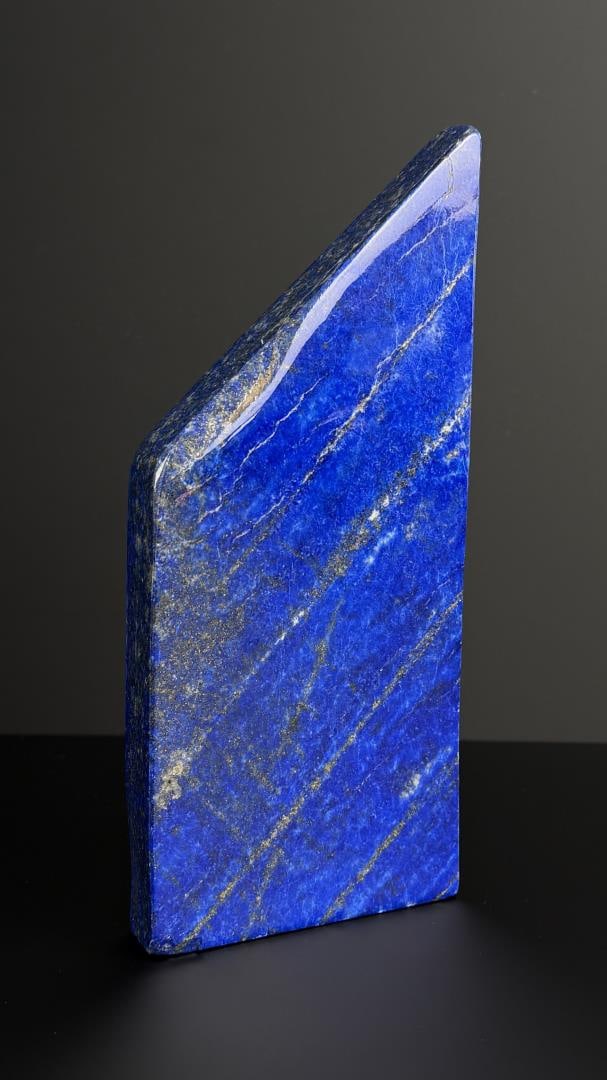 4425ct Lapis Lazuli Stone Carving Media: 885 grams. 7 3/4" by 3 1/2" by 3/4".