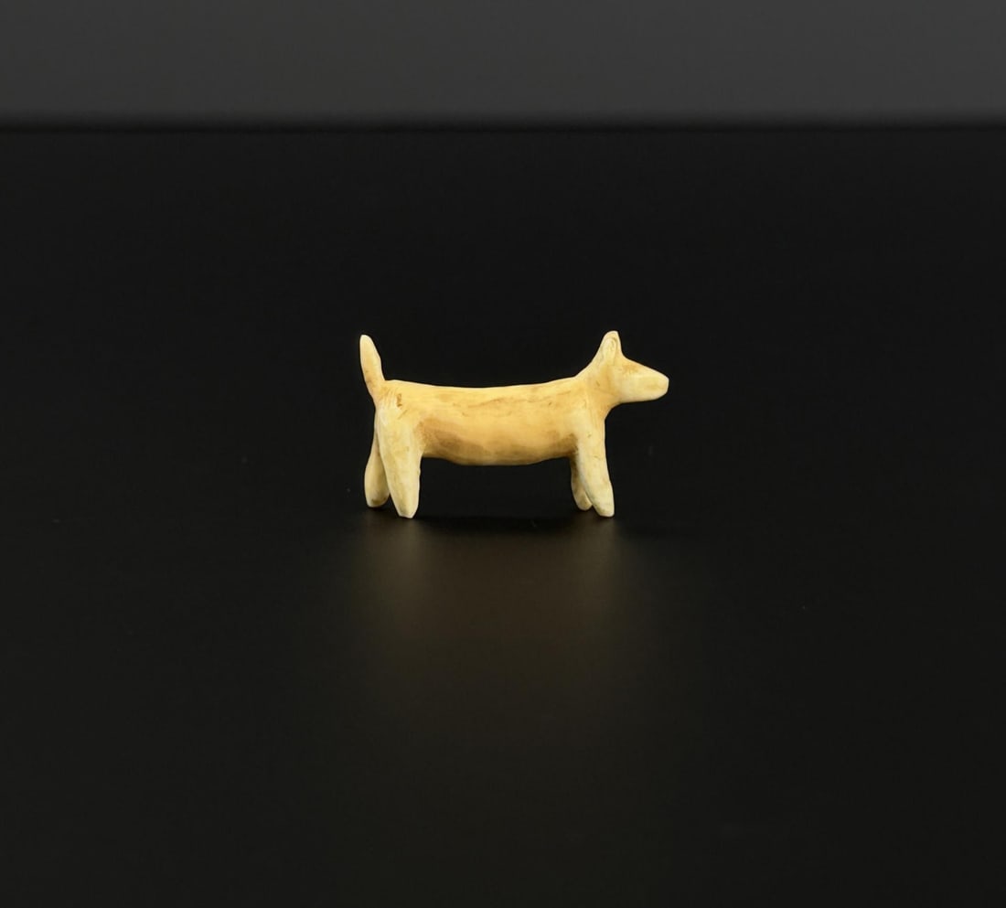 Ancient Thule Inuit Alaskan Eskimo Carved Dog: 1 1/8" by 5/8" by 1/4". Native made prior to 1972. This item cannot be shipped to Oregon, California, Hawaii, New York, New Jersey, Internationally, or any other state that prohibits.