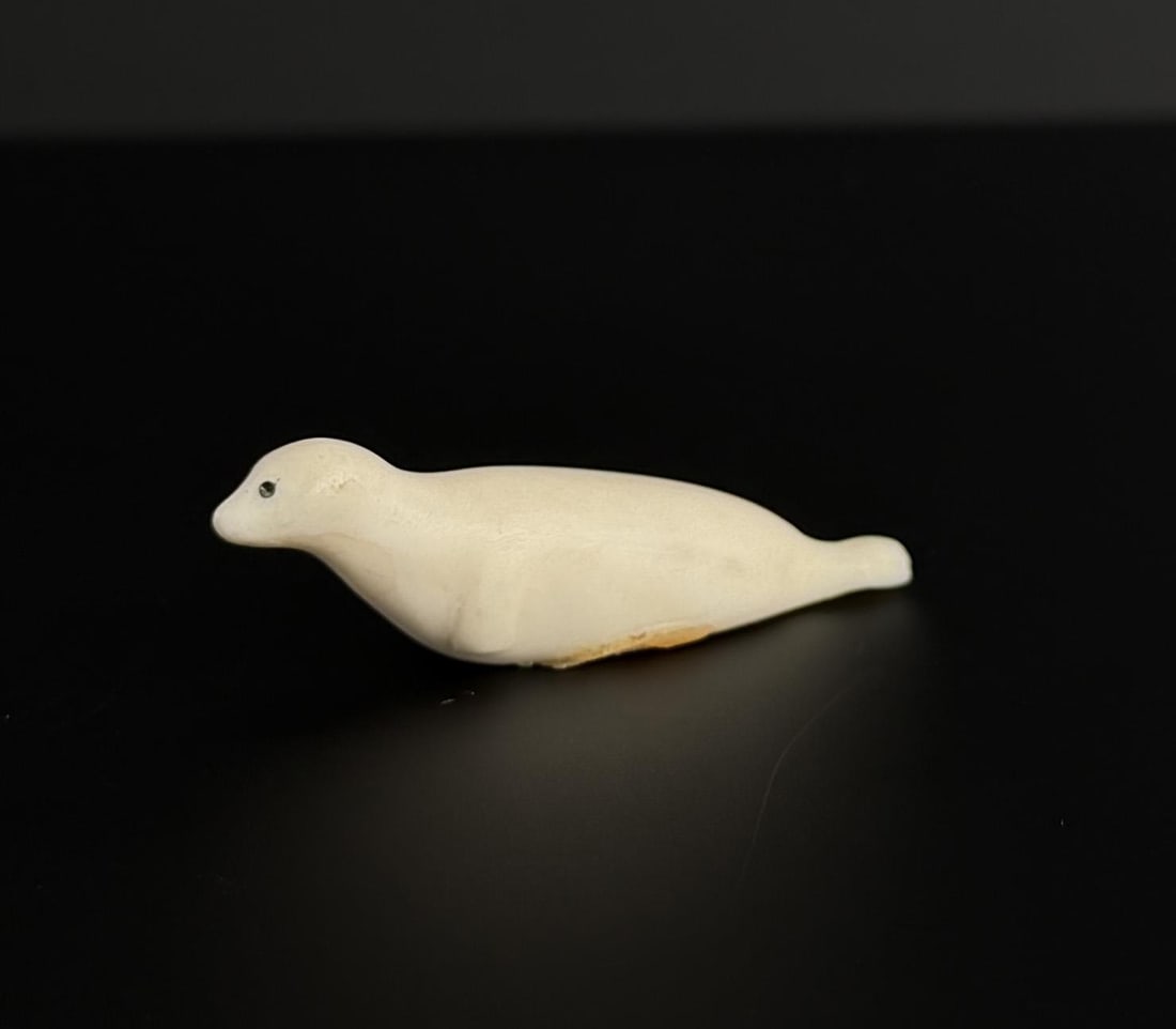 Alaskan Inuit Eskimo Ivory Seal Carving: 1 7/8" long. Native made prior to 1972. This item cannot be shipped Internationally, or any other state that prohibits.