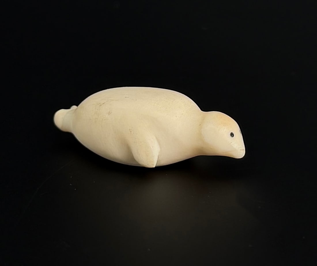 Alaskan Inuit Eskimo Ivory Seal Carving: 1 3/4" long. Native made prior to 1972. This item cannot be shipped Internationally, or any other state that prohibits.