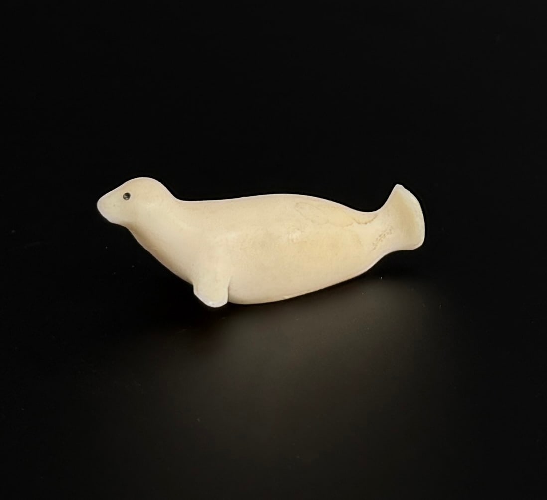 Alaskan Inuit Eskimo Ivory Seal Carving: 1 3/4" long. Native made prior to 1972. This item cannot be shipped Internationally, or any other state that prohibits.