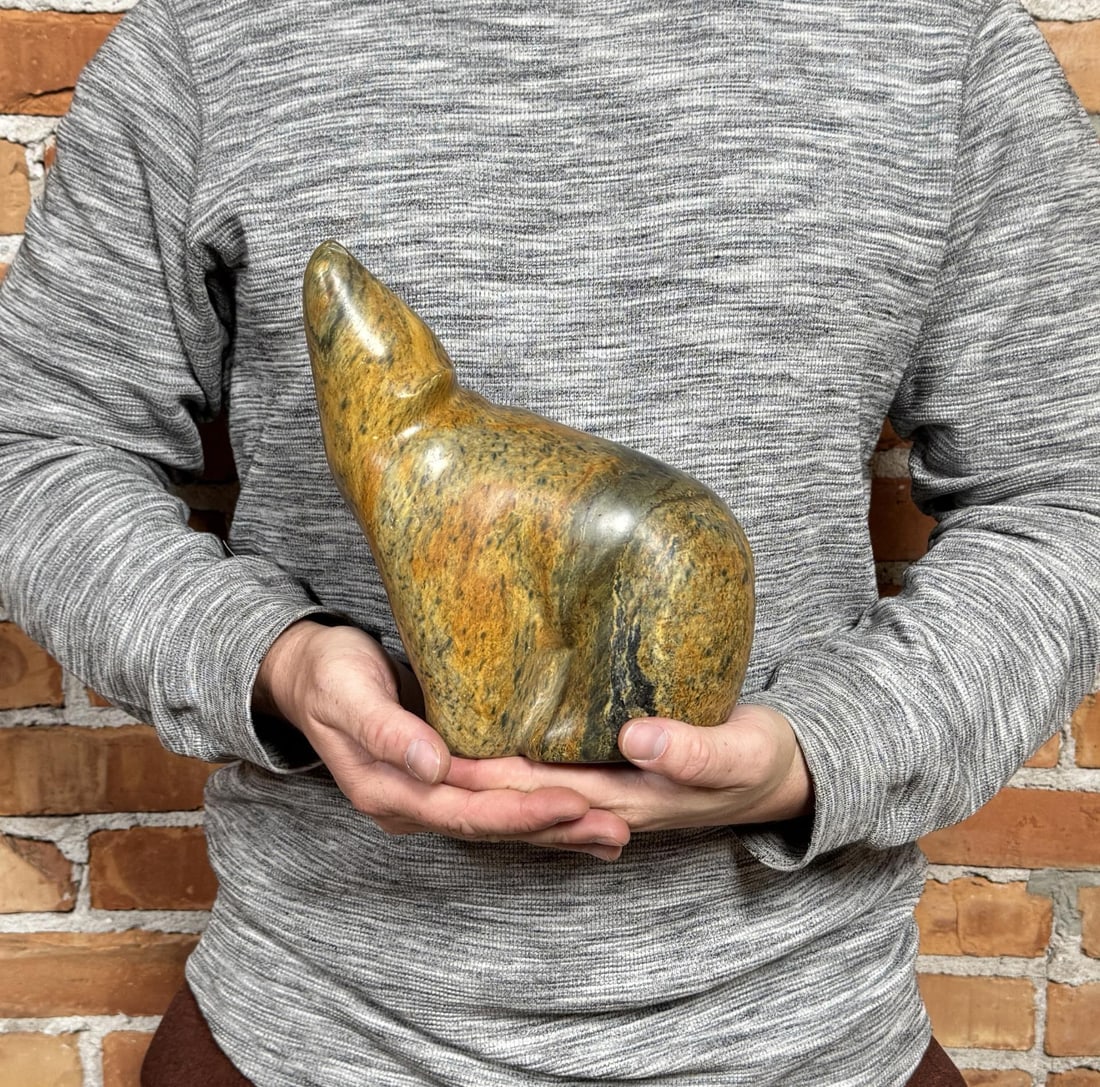 Sharon Spencer Inuit Soapstone Polar Bear Carving: 8 1/4" by 7 3/8" by 4 5/8" Sharon Spencer (20th/21st Century) is active/lives in Washington. Sharon Spencer is known for Sculpture.