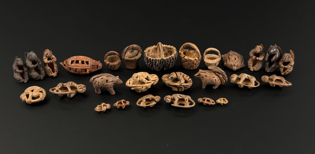 Antique Folk Art Peach Pit Carvings: 27 total