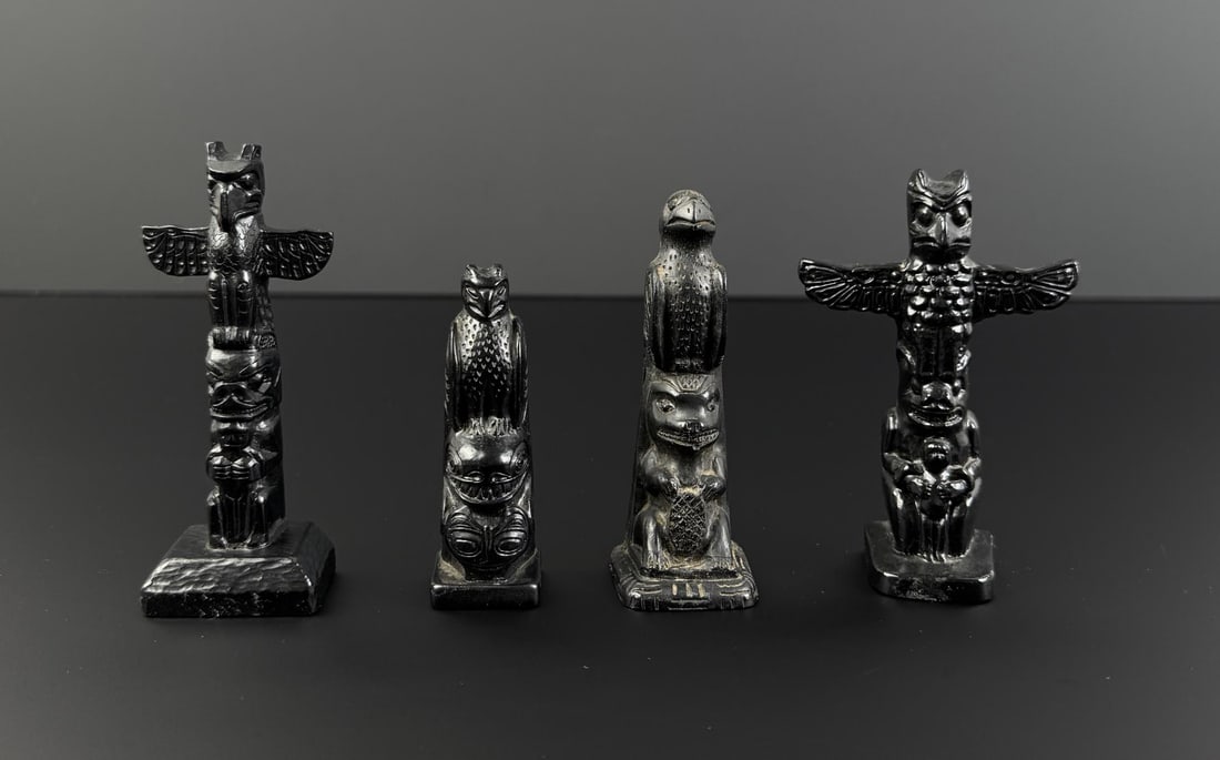 Collection of Northwest Coast Resin Totem Poles: Nice grouping.